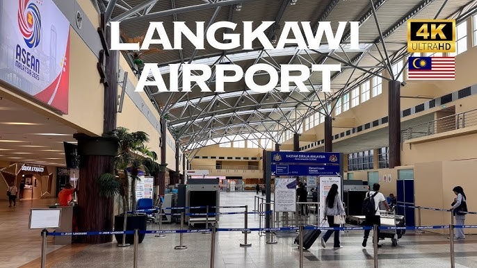 Langkawi International Airport (LGK) terminal exterior with modern design, runway area, and surrounding greenery in Langkawi, Malaysia.