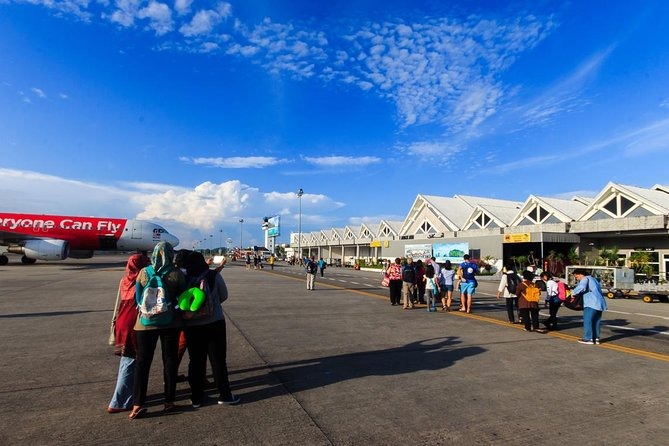 Langkawi International Airport (LGK) terminal exterior with modern design, runway area, and surrounding greenery in Langkawi, Malaysia.